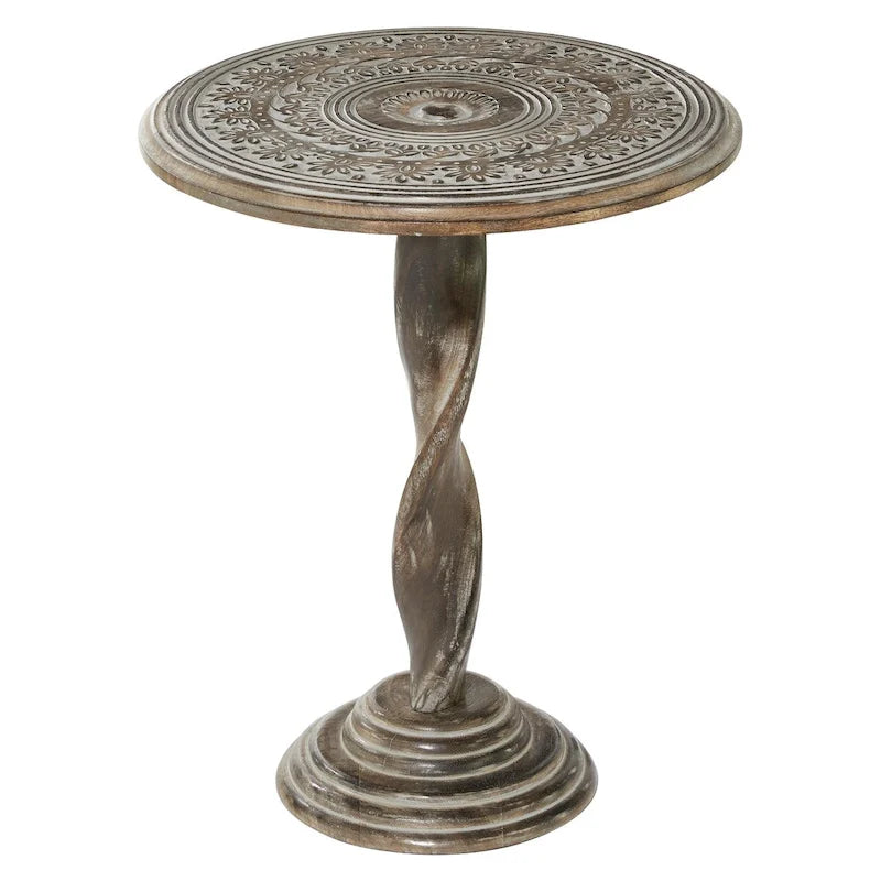 Table d'appoint sculptée en bois de manguier avec motifs floraux, pieds en spirale et finition vieillie grise